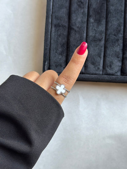Silver colored vancleef ring