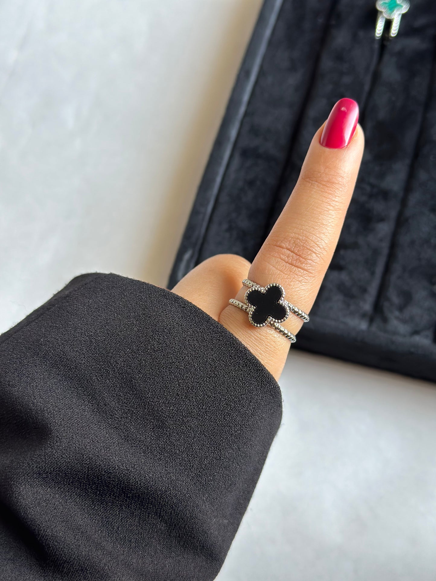 Silver colored vancleef ring