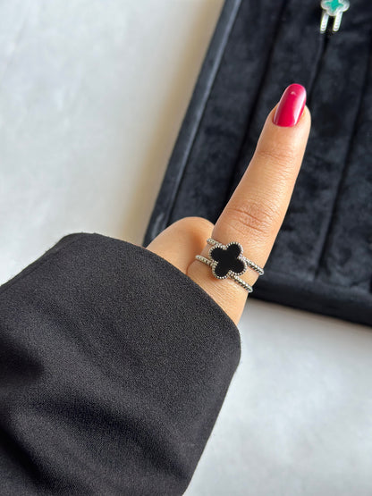 Silver colored vancleef ring