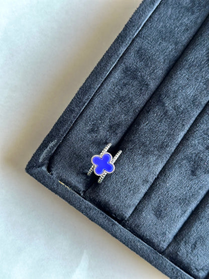 Silver colored vancleef ring