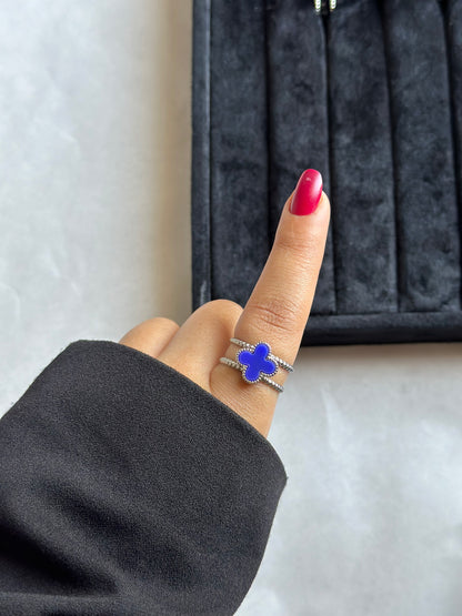 Silver colored vancleef ring