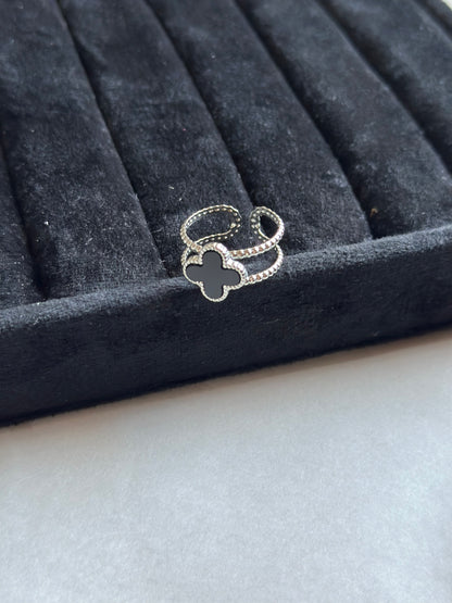 Silver colored vancleef ring